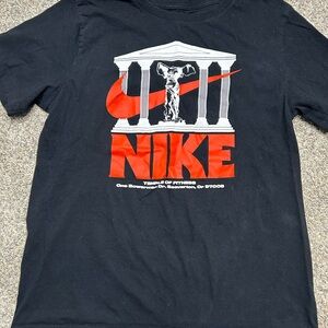 Nike “The Nike Tee” Graphic Shirt | Size M